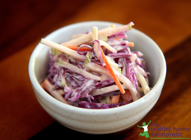 homemade coleslaw in a white ceramic cup