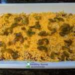 jalapeno slices on top of chili cheese dip