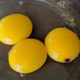 blood spot egg cracked in a glass bowl