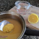 millet pearls soaking in a pot on a counter