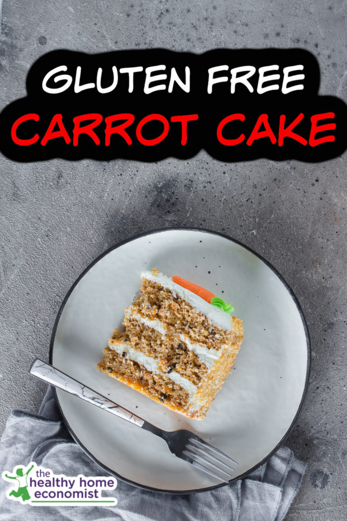 gluten free carrot cake on a plate with a fork