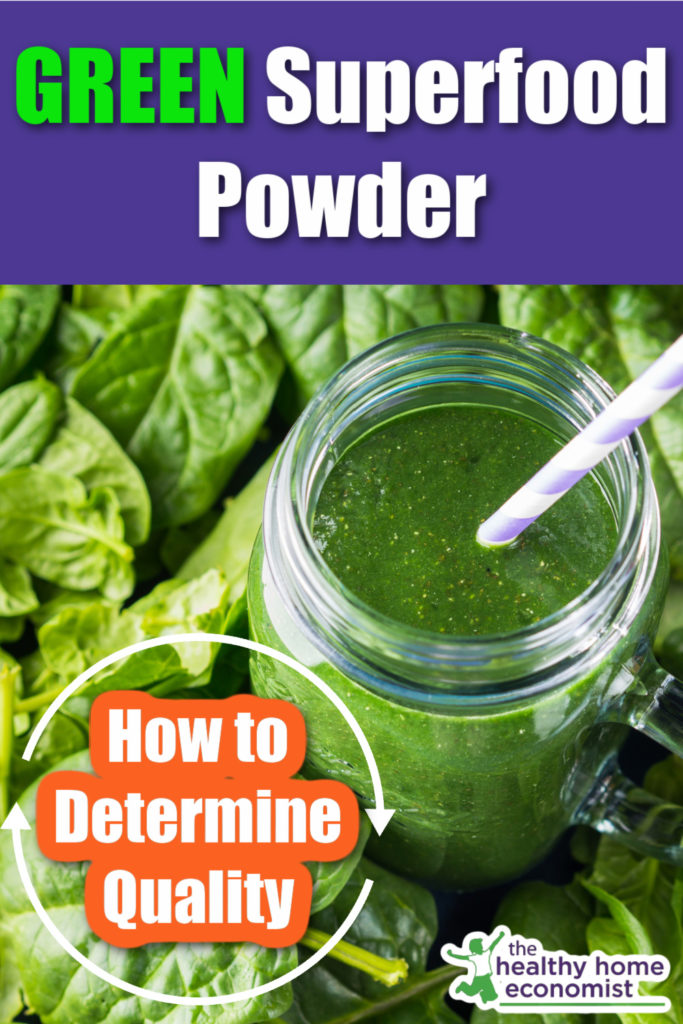 green superfood powder in a mug with straw