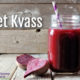 mug of beet kvass with straw