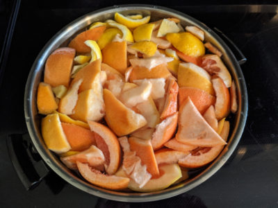 chopped citrus peel in a large pot to make diy hydroxychloroquine