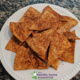 dorito-style chips on a plate on granite countertop