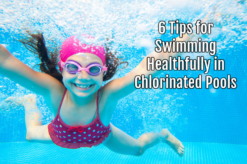 little girl swimming underwater in a chlorinated pool