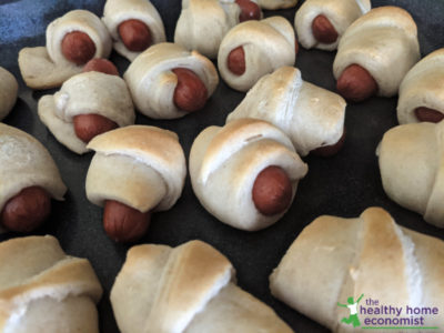 healthy pigs in a blanket baking in the oven