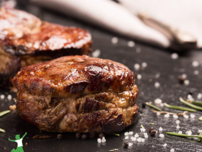 grassfed filet mignon steak on a dark background