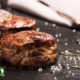 grassfed filet mignon steak on a dark background
