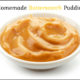 bowl of homemade butterscotch pudding with a white background