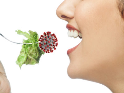 woman taking a bite of mRNA salad