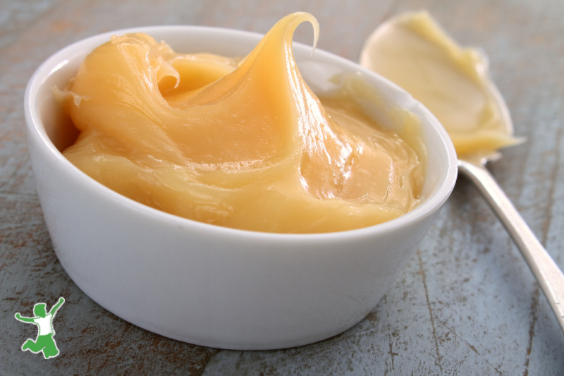 lemon curd in white ramekin with spoon