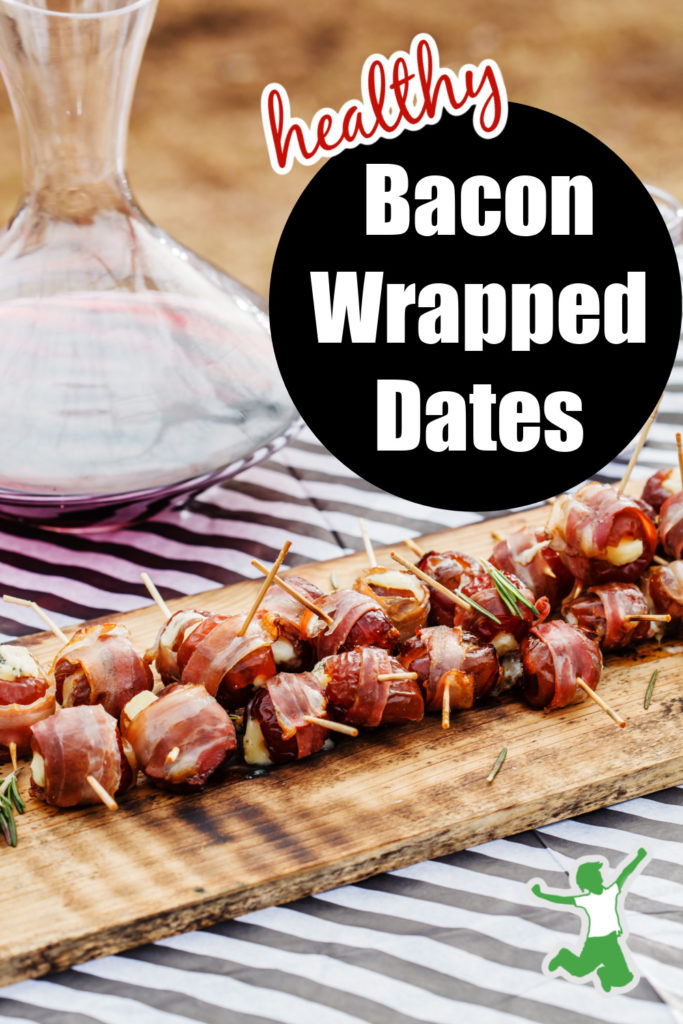 no-bake dates wrapped in bacon on a cutting board