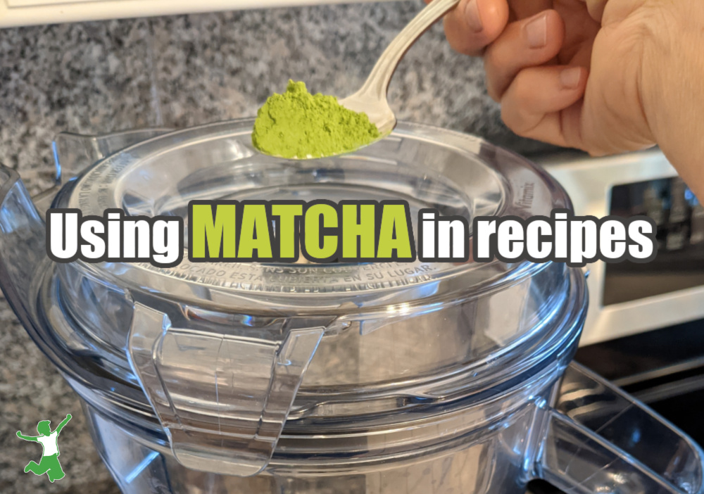 spoonful of matcha green tea powder added to a vitamix smoothie