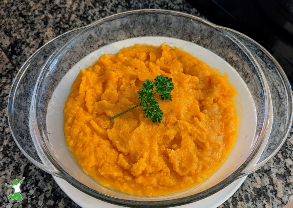 fermented sweet potatoes in a glass bowl on granite countertop