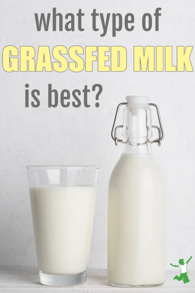 bottle and glass of healthiest grassfed milk with gray background.