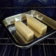 sticks of butter in the oven to make ghee
