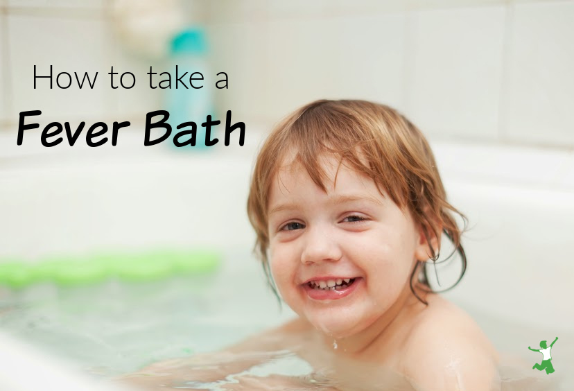 smiling child taking a fever bath for fast healing