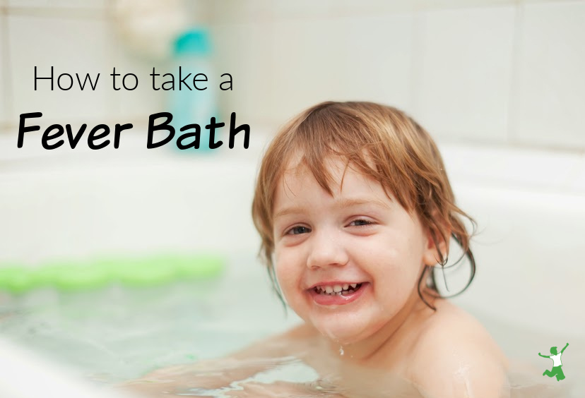 smiling child taking a fever bath for fast healing