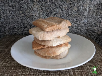 bread crusts stacked on a white plate