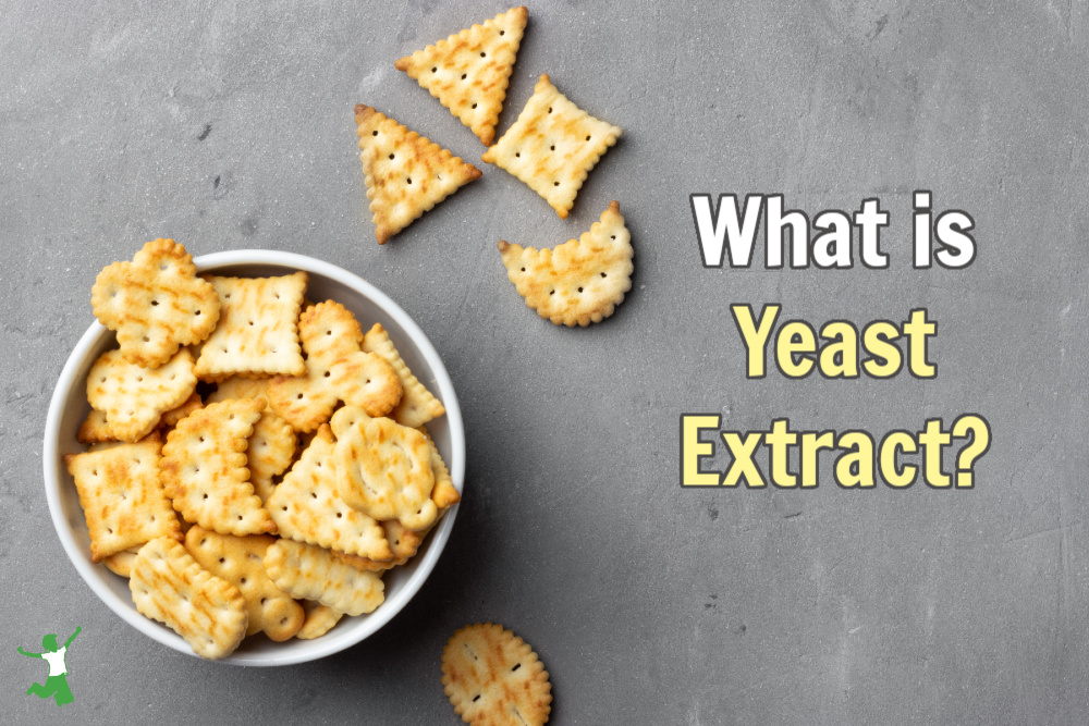 crackers containing yeast extract in a white bowl grey background