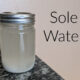 sole water in a small mason jar on granite table