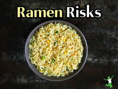 bowl of unhealthy ramen noodles on black table