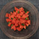 fermented watermelon and mint salad in glass serving bowl