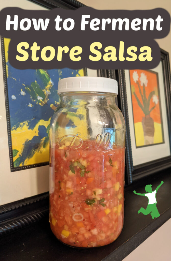 store salsa cultured in a mason jar on black shelf