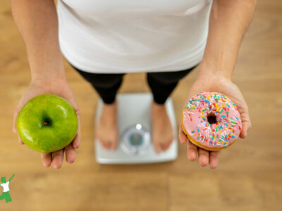 woman with diet triggered liver disease standing on scale