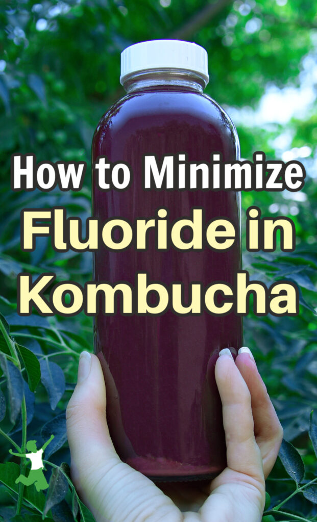 woman holding bottle of kombucha with high fluoride