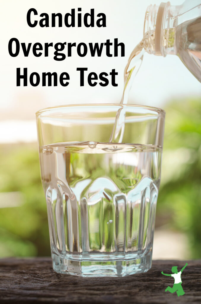 Pouring a glass of water for candida saliva test at home
