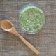chimichurri sauce in glass bowl with spoon
