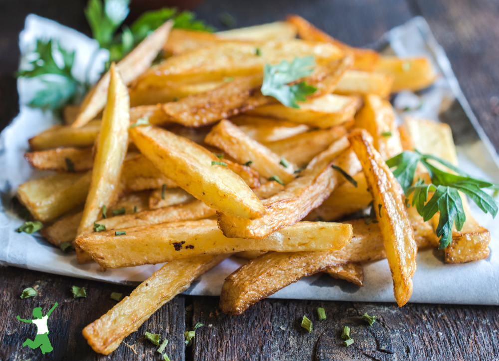 healthy French fries served on the wooden table