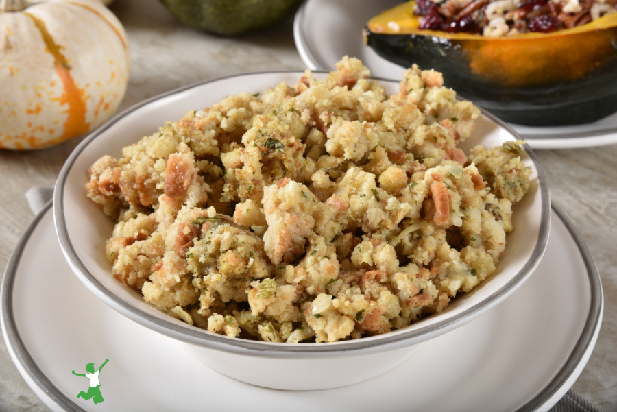 healthy sprouted stuffing in a white serving bowl