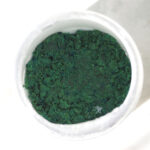 low oxalate powdered greens in a white cup