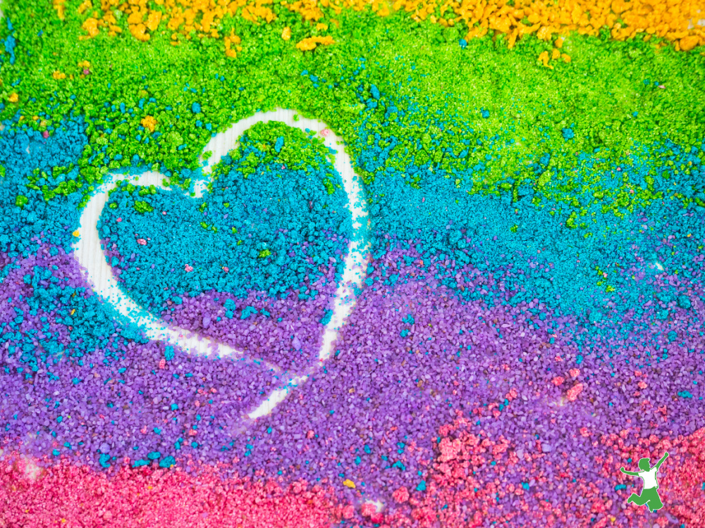 sand of many colors with etched positive mood heart symbol