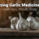 garlic for home remedy use on wooden plank