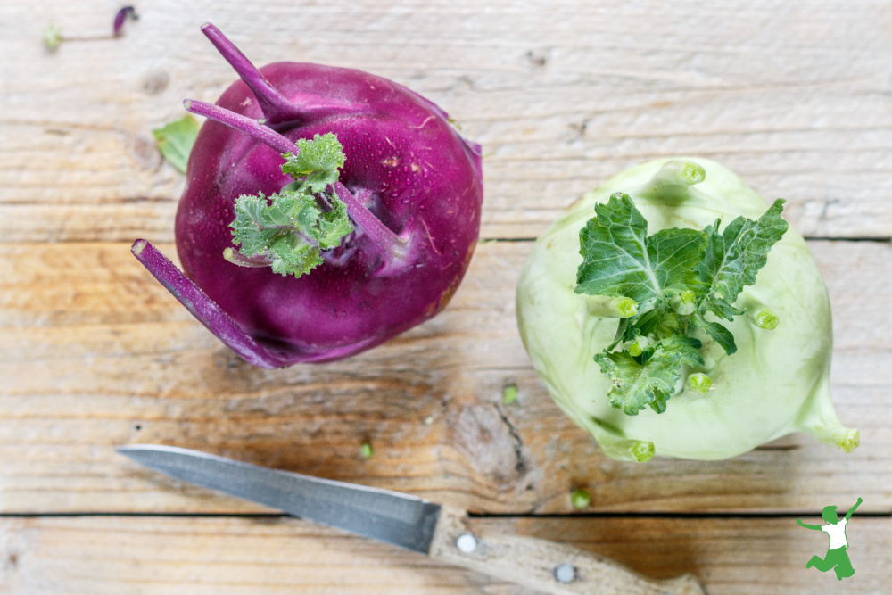 purple and green kohlrabi on wooden counter
