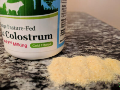 colostrum supplement powder on table