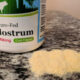 colostrum supplement powder on table