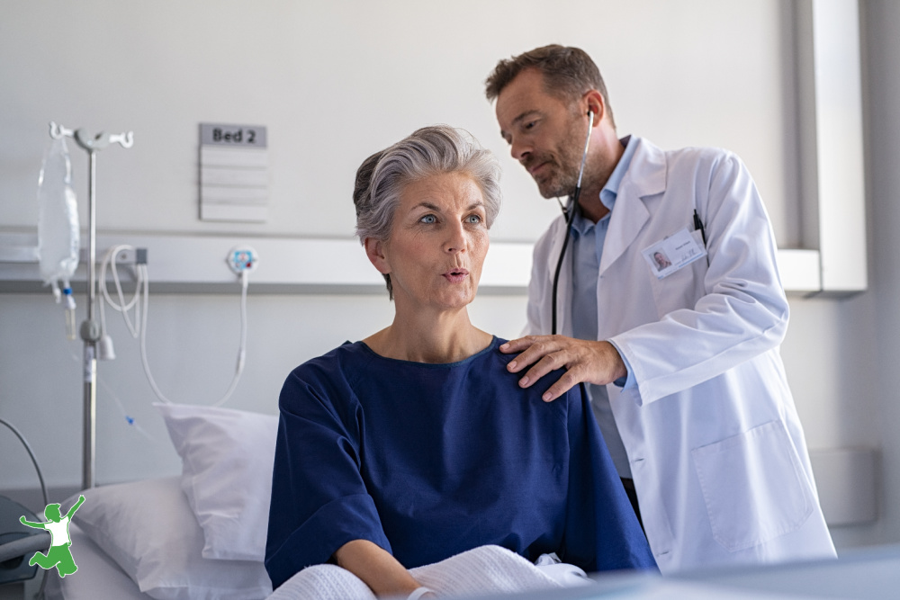 older woman with shallow breathing problems being checked by a doctor