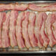 bacon strips in a pan cooked hands-free