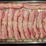 bacon strips in a pan for hands-free cooking