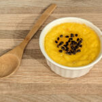 passionfruit custard in a white ramekin