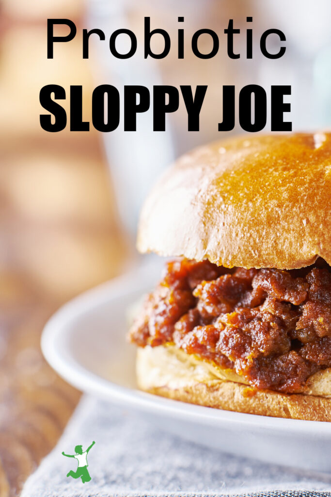 healthy sloppy joe on white plate with blue napkin