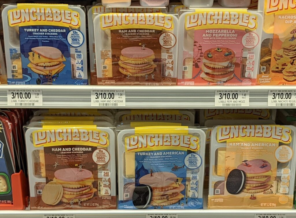 display of unhealthy lunchables on supermarket shelves