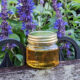 neutral taste coconut ghee in glass jar flower background