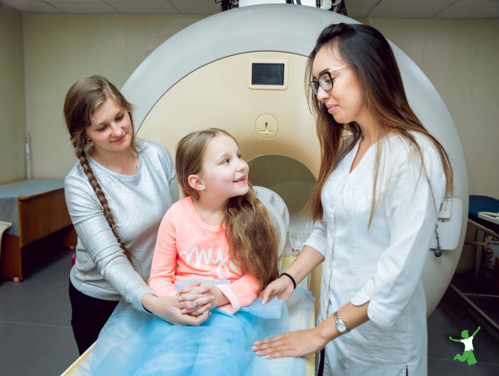 young girl protected from radiation from MRI