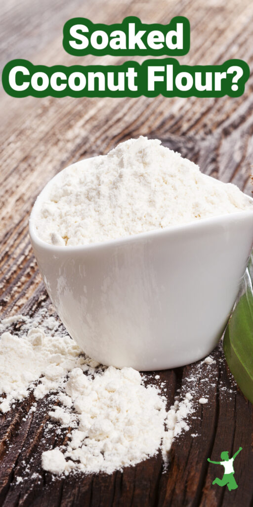 soaked coconut flour in white bowl wooden background